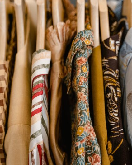 assorted clothes on hangers