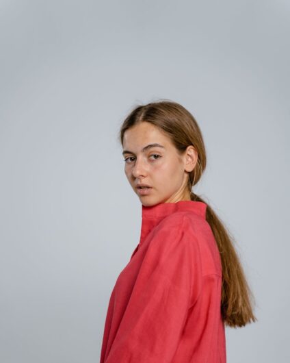 woman in red long sleeve shirt